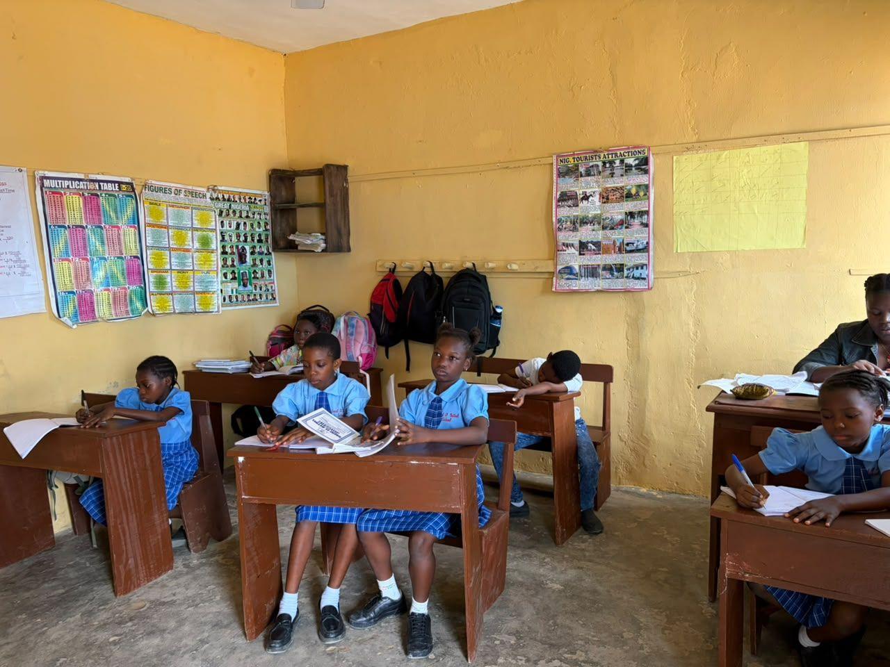 Pupils working at their desks in a classroom